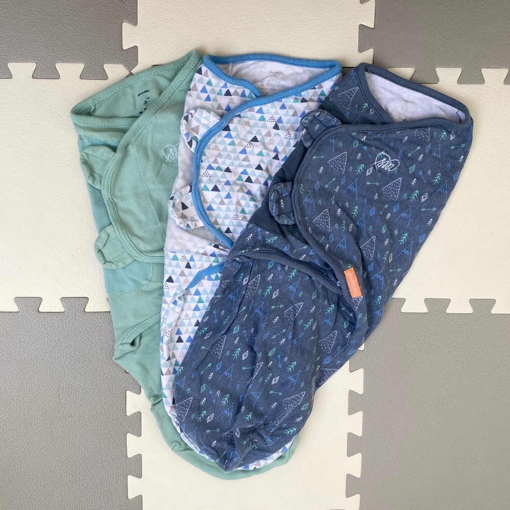Wearable blankets and swaddle bundle